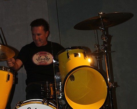 Lucky Lehrer gives his drum set on display at the Hard Rock in Las Vegas a rage test.